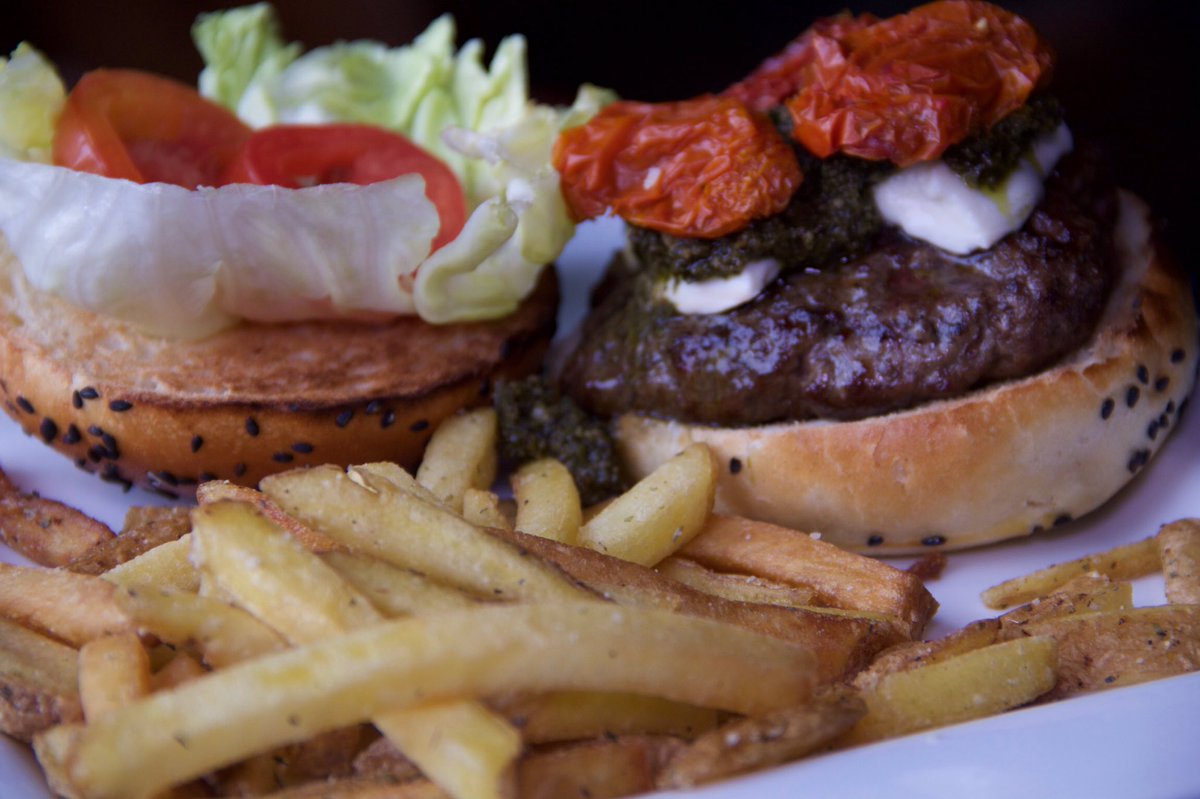 It's college night at Traps. Come grab a beer and this burger!