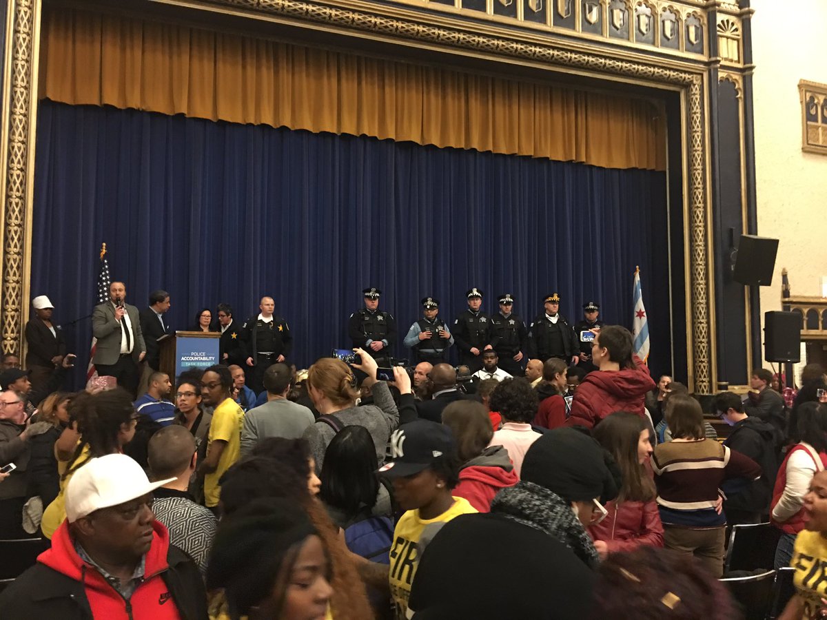 Kirstin_Brock's tweet photo. RECAP: #CPD line the stage as @BYP_100 takes over #cpdtaskforce meeting. #SayHerName https://t.co/HnMiHSGHQS