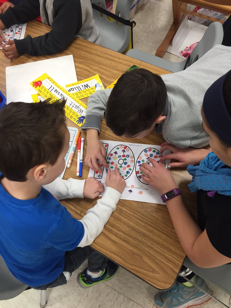 SnyderNLE's tweet photo. Kindergarten buddies...100th day activity...counting, coloring, identifying numbers #nle16 #lcps16 @terri_magoffin https://t.co/mOk44WXmaI