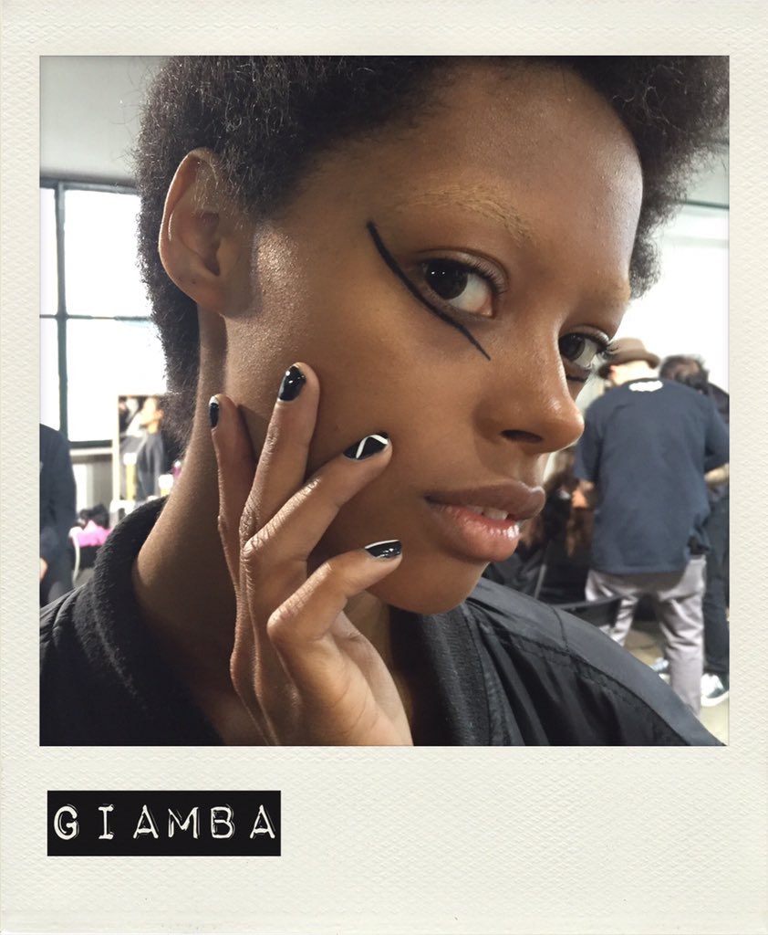Marilyn Manson-inspired graphic eyes and DIY-style nail art at @giambaparis #MFW