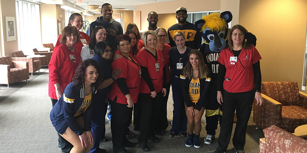 Pacers's tweet photo. Smiles abound as Stuckey, @chefVOYardee &amp; @masfresco visited @IU_Health Simon Cancer Center: https://t.co/RAzzbgNFdl https://t.co/QBwVH2TJvE