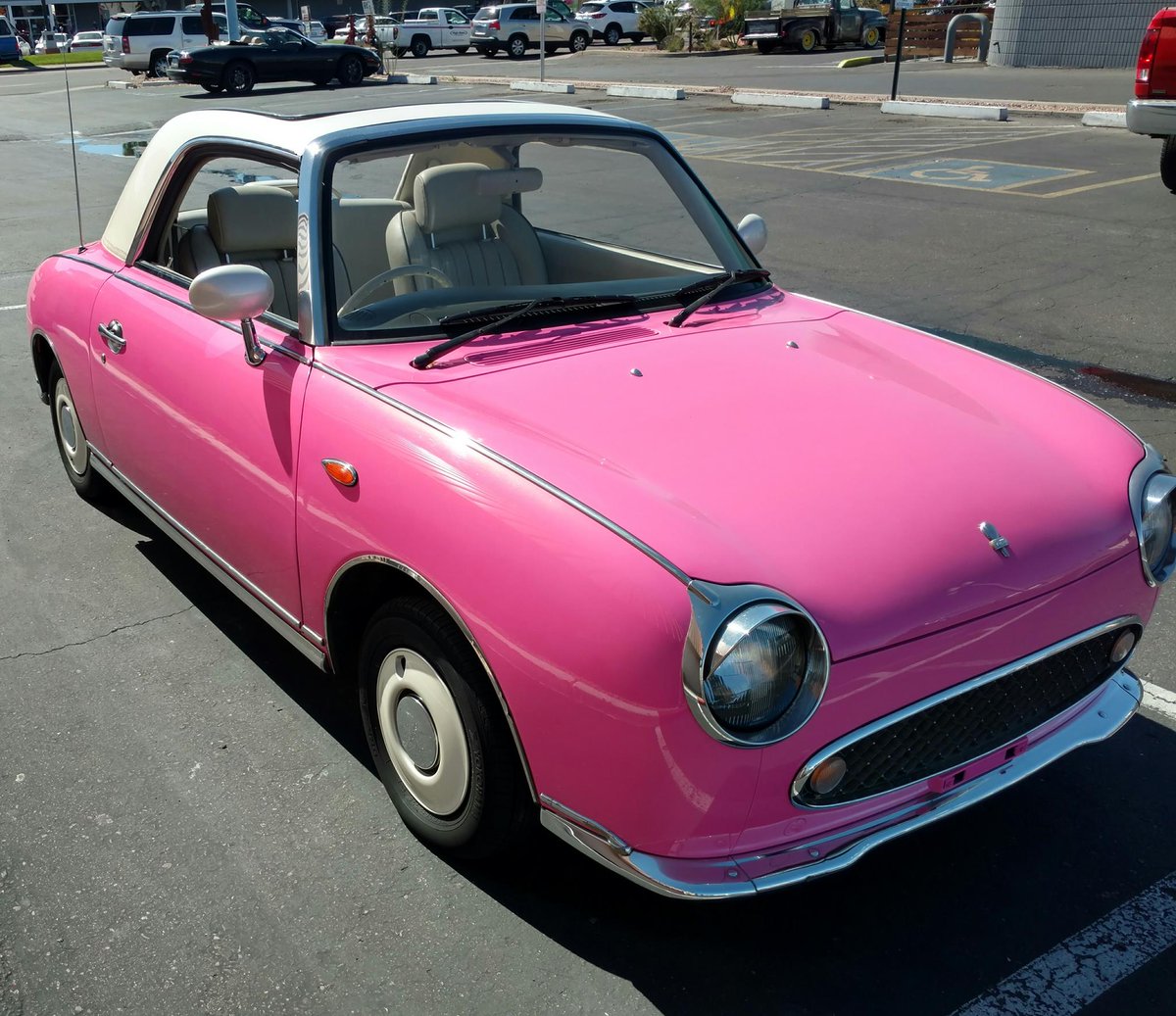 danjmcs's tweet photo. Such a cool little car and out on a perfect #azwx day. #PinkFig #Figaro #NissanFigaro https://t.co/RX5UP5g36X https://t.co/mHXrnhjmLM