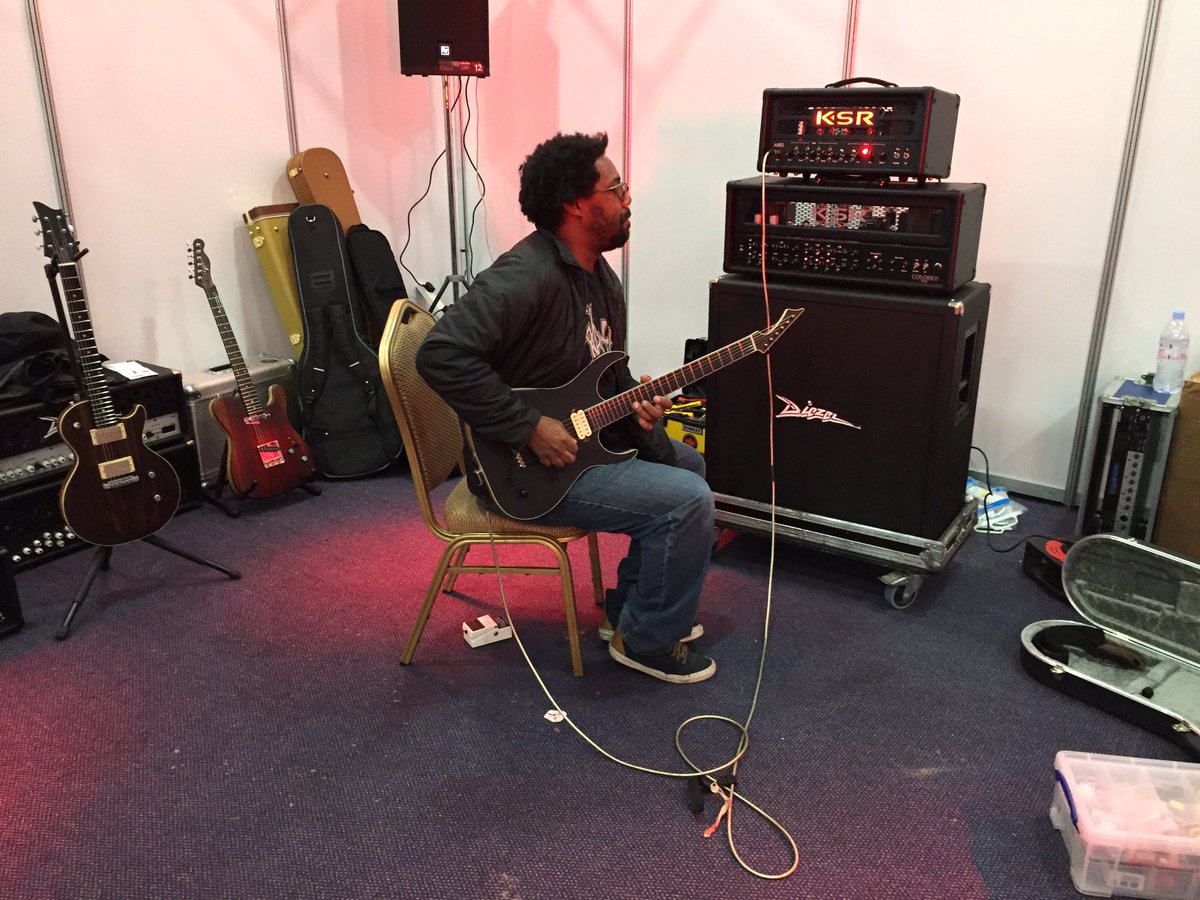 Setting up at the guitar show and some random guy turns up with a guitar &amp; starts playing.... No idea who he is ;)