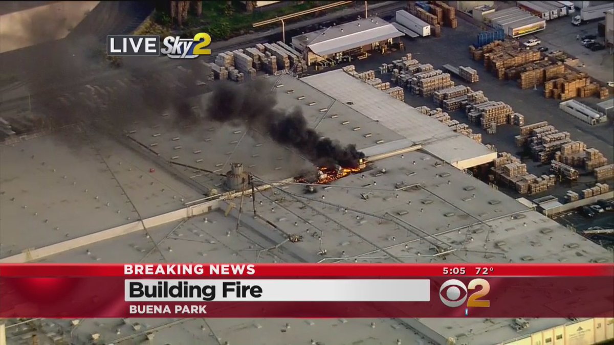 JUST IN Crews battle fire at commercial building in Buena Park. CBS