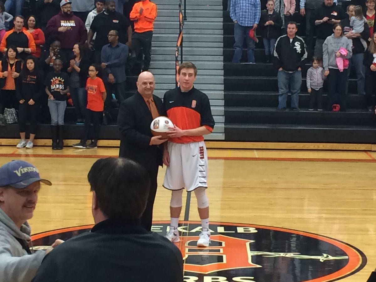 dc_preps's tweet photo. DeKalb honoring @mike_pollyy before game against Yorkville. He scored his 1,000th point last week https://t.co/Ilrlxlmrw2