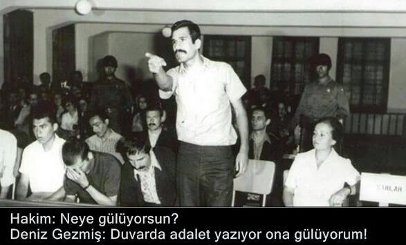 kacsaatolduson's tweet photo. Hakim:Neye gülüyorsun? 
Deniz:"Duvarda ADALET yazıyor da" diyeli yıllar oldu. Ama Değişen bir şey yok
#DenizGezmiş https://t.co/K9UC6Rf621