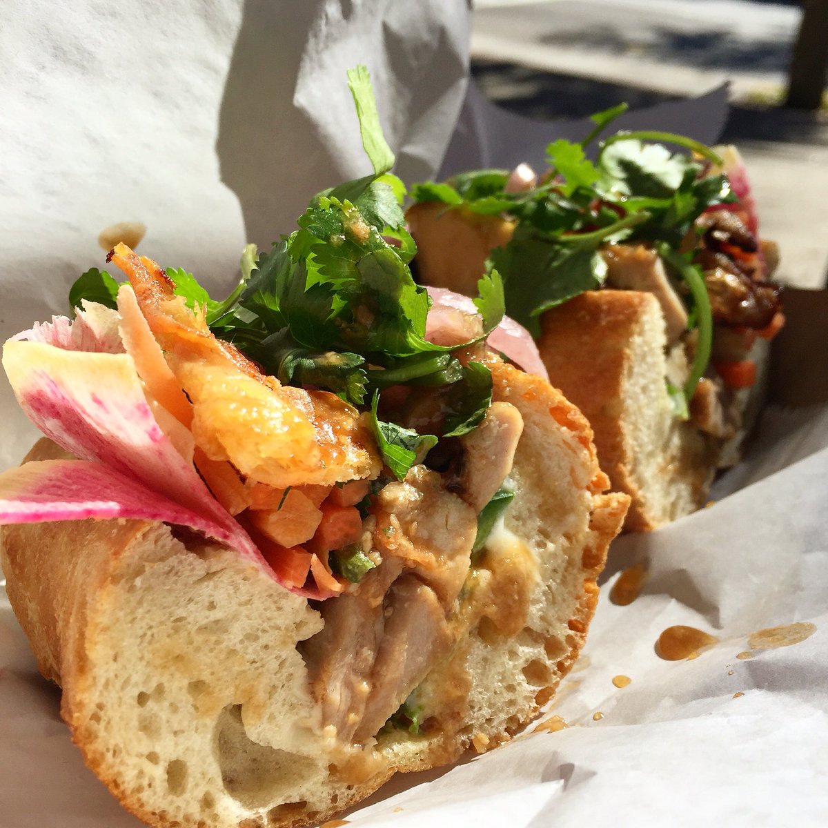 PinkBellies's tweet photo. Tonight! At the @butcherandbee night bazaar! Roasted chicken banh mi with chicken skin crisps #BBBazaar https://t.co/LfeSN62gCv