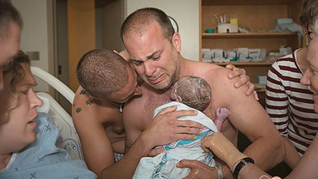CTVNews's tweet photo. Photo of Toronto dads holding newborn used in anti-surrogacy campaign https://t.co/SdtbVsO1pj https://t.co/S2K5YaMq44