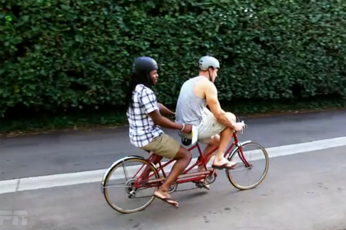 ForTheWin's tweet photo. Watch Richard Sherman and Rob Gronkowski ride a tandem bike and chill in Snuggies - https://t.co/oLSmGzA83E https://t.co/Nj3vFYbjax
