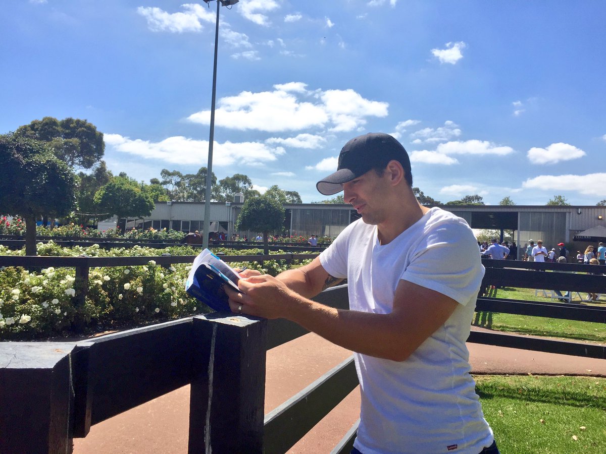 RacingVictoria's tweet photo. #VicOwner ambassador @billyslater studying the #InglisPremier catalogue on Day 1 at Oaklands - what's your top Lot? https://t.co/BaD6Vu19ei