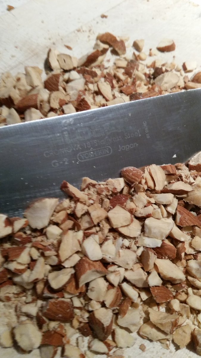 Chop the almonds by hand, she said. It's better, she said. <a href="/annabelcrabb/">Annabel Crabb</a> #bananasfostervacherin #specialdelivery