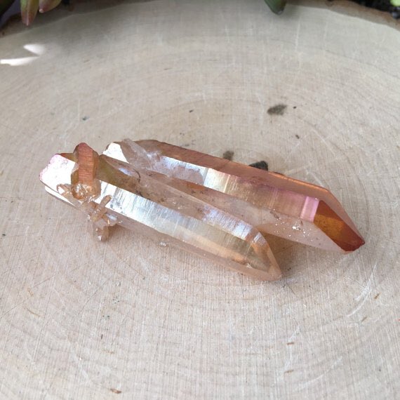 _ArieAria_'s tweet photo. Tangerine Aura Quartz available at https://t.co/NbvvGXrdel use code: leap29 for 29% off entire order. #etsy #quartz https://t.co/g5ouPvK9nM