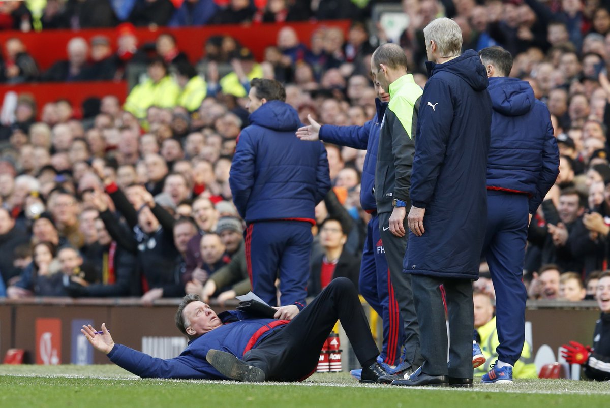 Louis van Gaal mimics a dive after remonstrating with the officials
