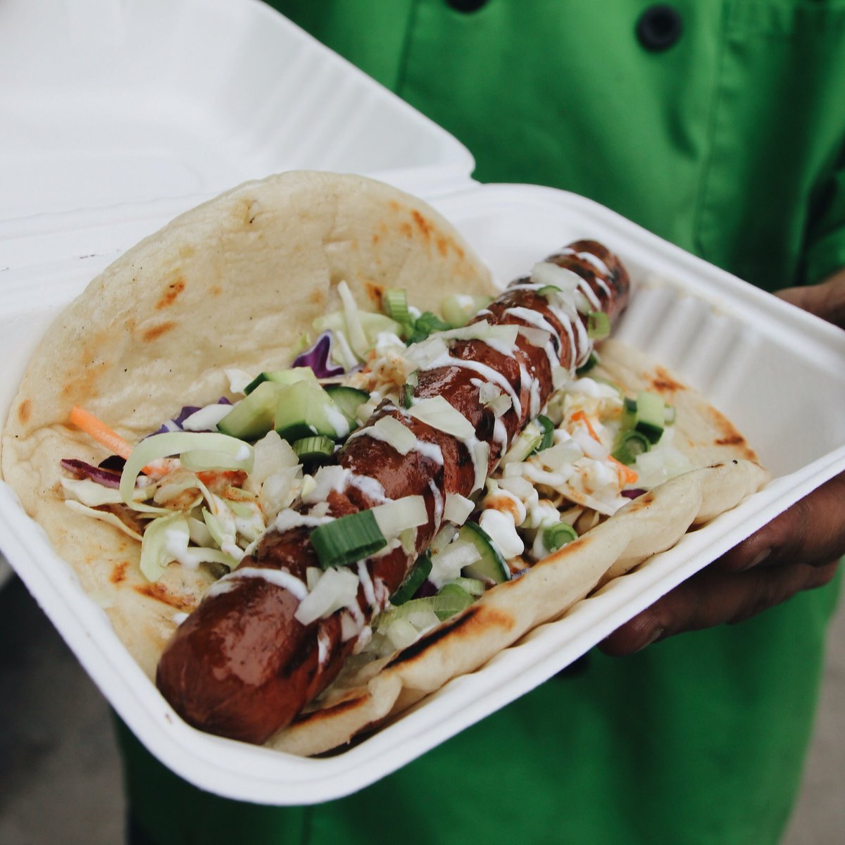 yycfoodtrucks's tweet photo. The Flammin' Naan Dog from @takeitandgoyyc is worth being covered in hot sauce for 🙌🏼 #CHGS16 @HomeShowsAB https://t.co/XctbSzhQqq