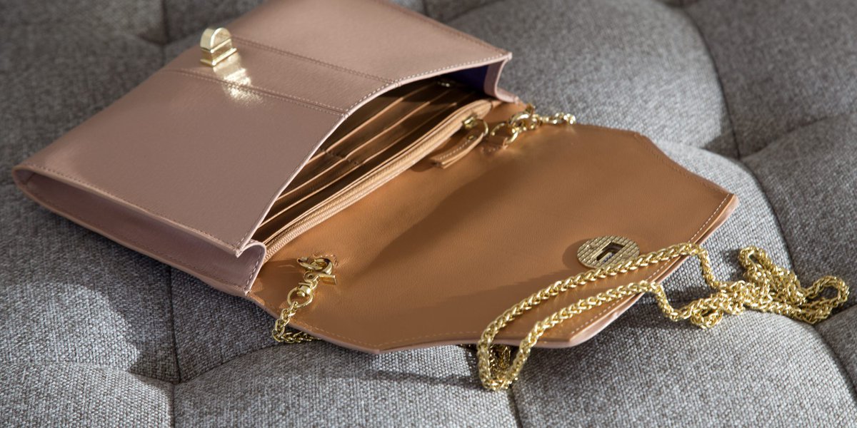 #whatsinmybag always intrigues us. Shop our pocket clutch with a built-in wallet &amp; tell us what's in your Tusk bag!
