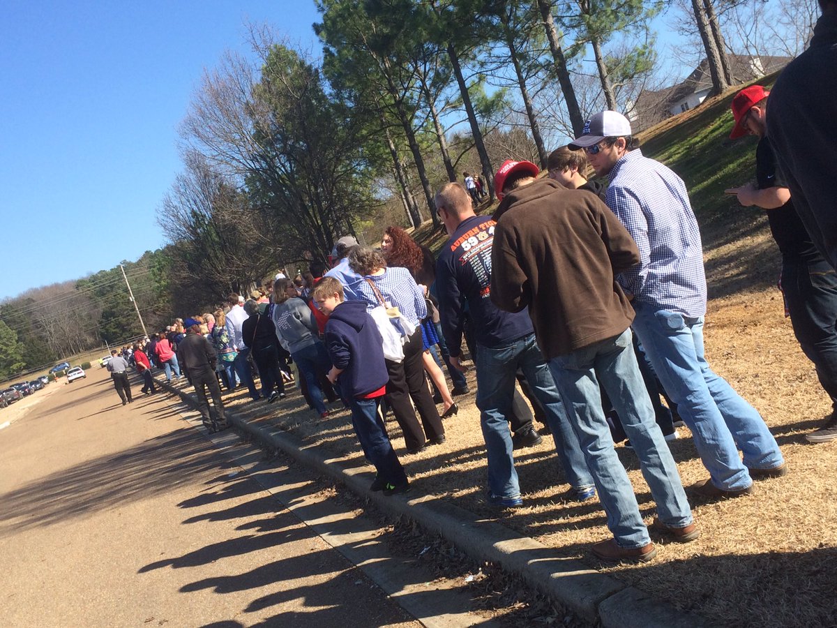 BenBoles's tweet photo. Line to see @realDonaldTrump at #bobjonesHS 90 mins early. #yuge @edacy @WAAYTV (shuttle line) https://t.co/D1bLasVXPL