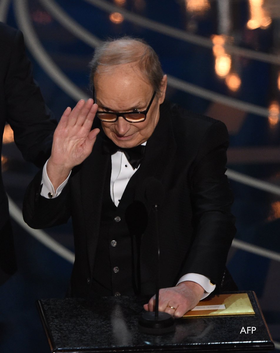 BBCNewsEnts's tweet photo. "There isn’t a great soundtrack without a great movie that inspires it" Standing ovation for Ennio Morricone #Oscars https://t.co/0pOr7KkBFd