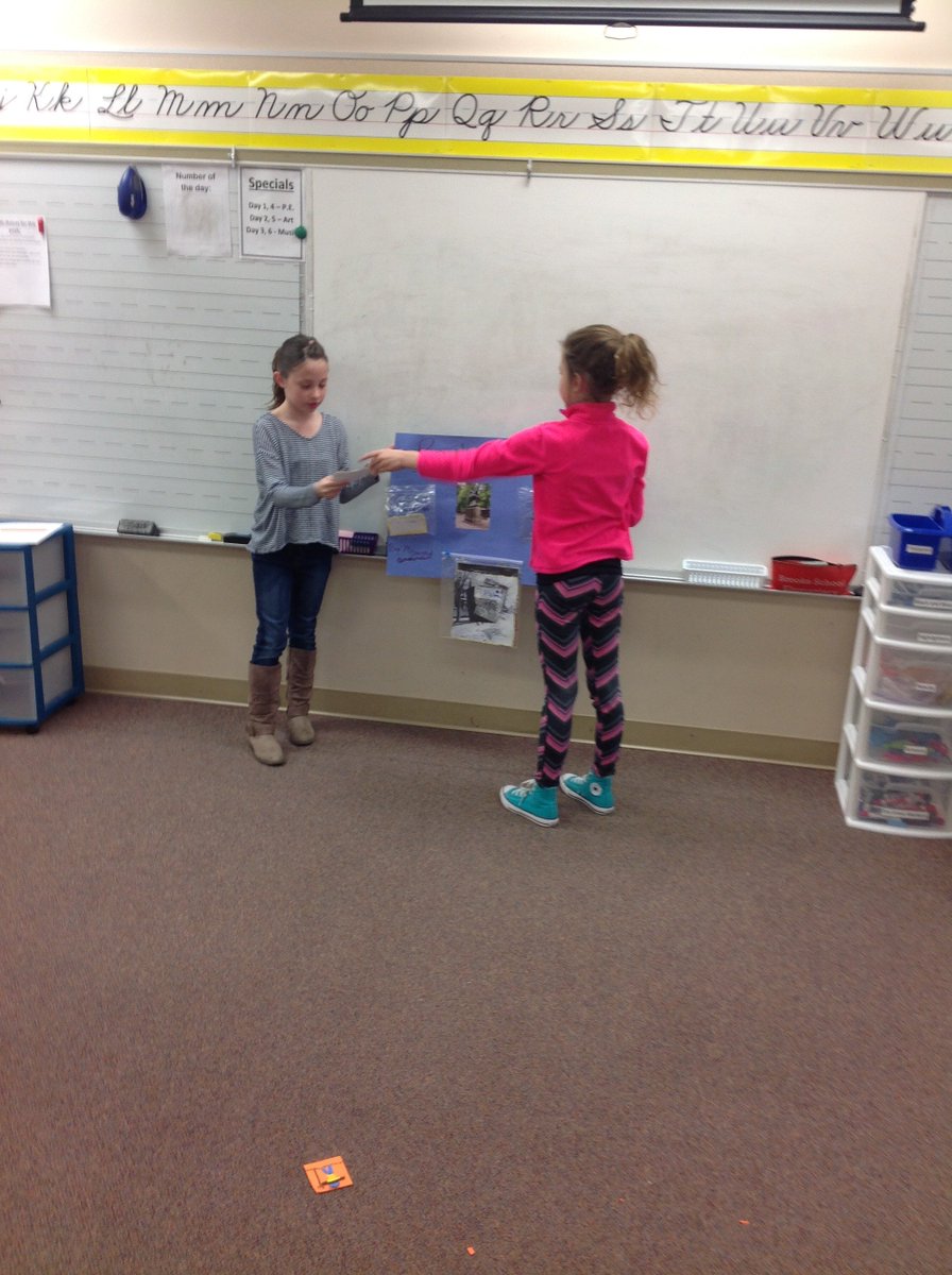 Presenting Revolutionary War poster projects to the class