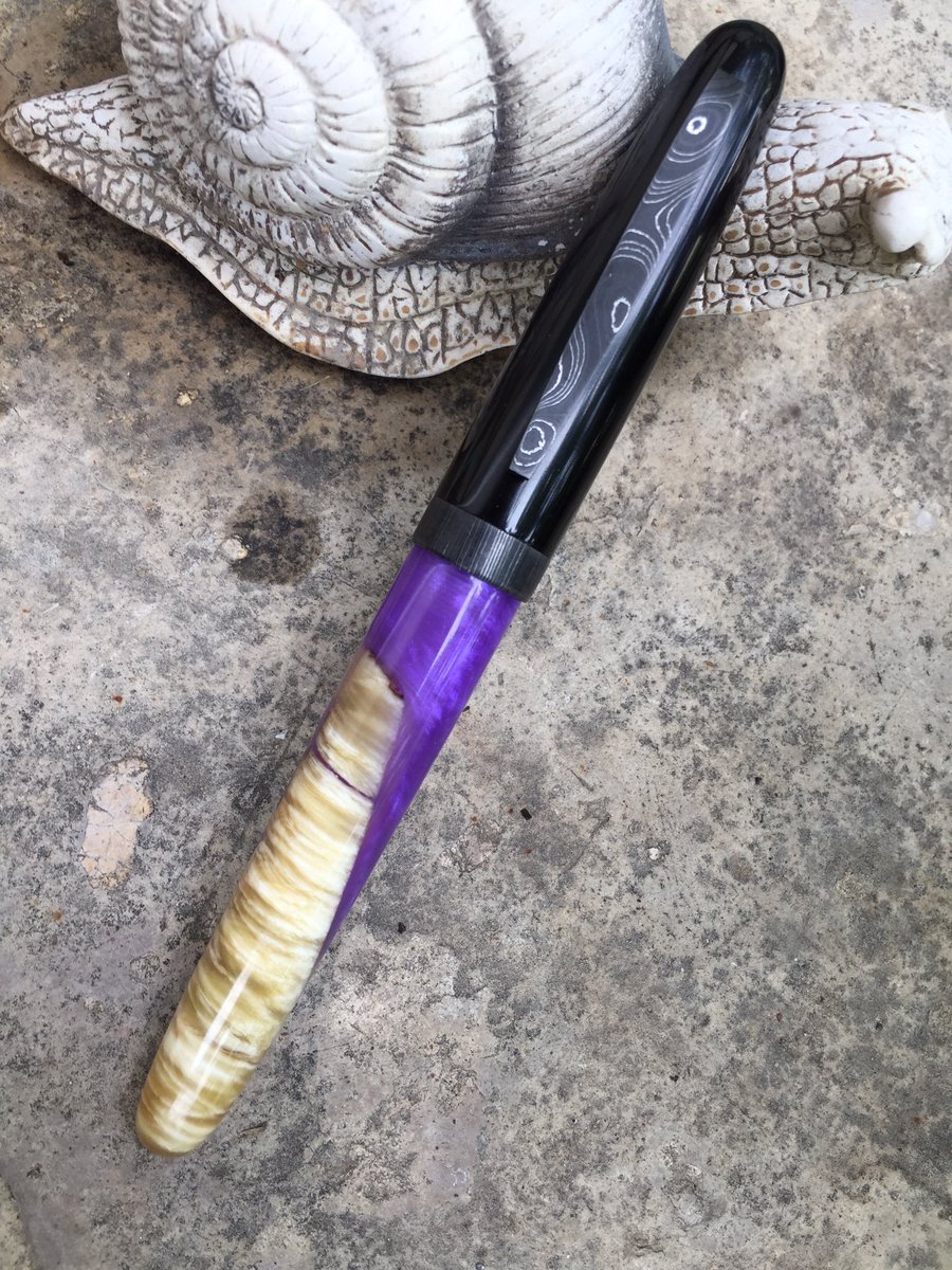Black ebonite, musk ox with purple acrylic and Damascus
