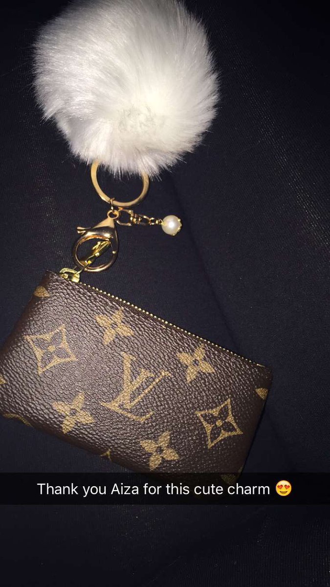 MiszxBri's tweet image. Love my LV fluffy charm. 😍 #LouisVuitton #keypouch #fashion