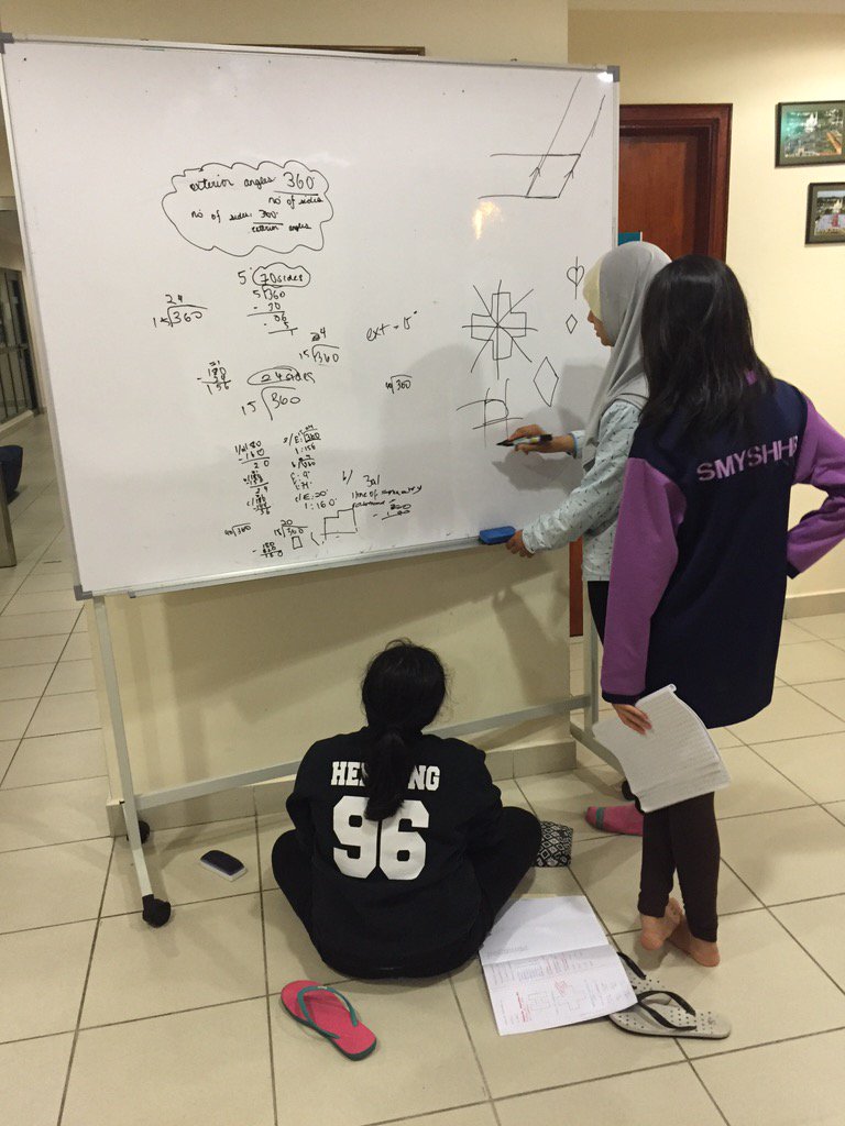 OspreyJIS's tweet photo. Maths revision taking priority for the year 8s tonight. #peer2peerteaching๐ https://t.co/ZkYjDgXyDU