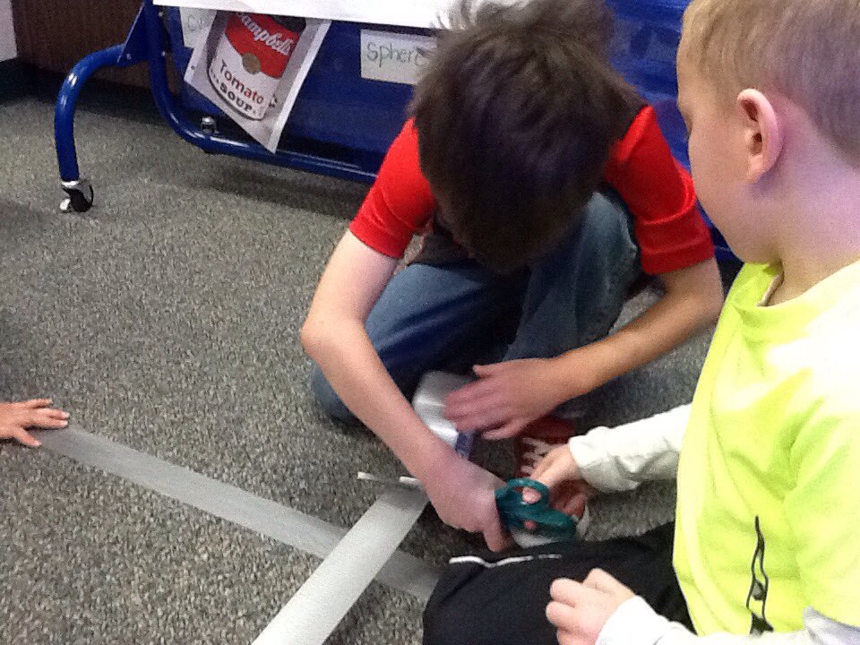 HESKaufman's tweet image. Learning to use rulers as we build a grid for dash to travel on #mathgroup