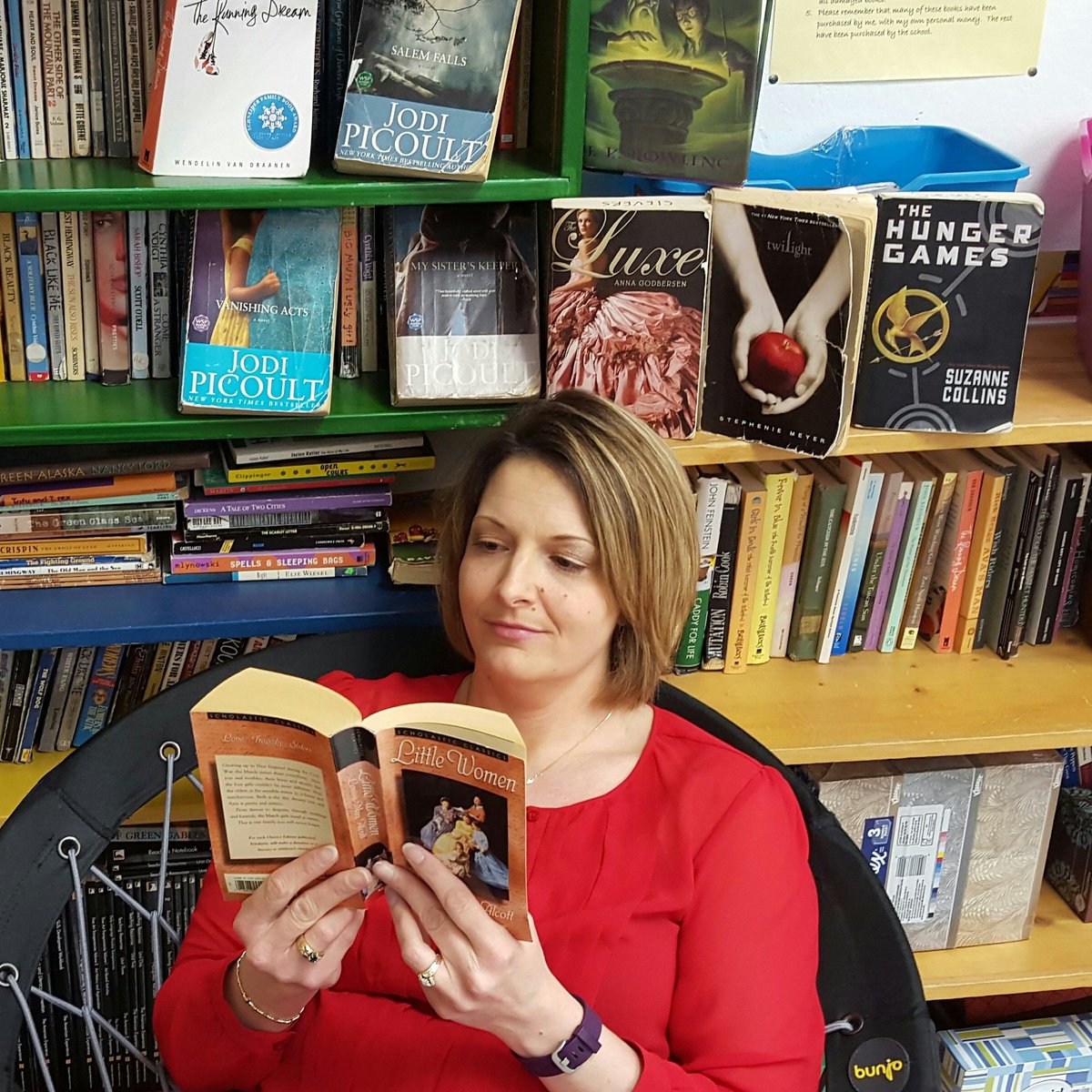SieversAnne's tweet photo. RAAD with Mrs. S. @mrsbassenglish @SieversAnne #howcanichoose #rbhsraad #ReadAcrossAmericaDay #Shelfies #redbud132 https://t.co/KHdC3jJfJ8