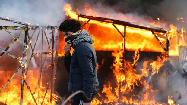 OccupyToronto's tweet photo. Grenades and water cannons used against refugees in Calais - https://t.co/Gj9vzDFx0Y #ows #france @OccupyParis https://t.co/EGw8cjgkuI