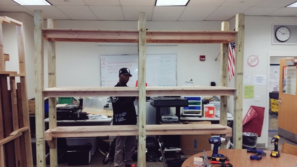 BuildingPedro's tweet photo. Part 2 of the sister shelving units @EngColeman sanding down the edge under @EdTechMaker Direction's at@pantheracad https://t.co/miWFmnkzO7