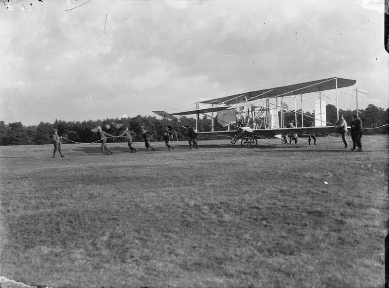 historic_rush's tweet photo. #Cody #Aircraft Mark IB being pulled into position by soldiers. #Farnborough @HantspolPlanes @FIAFarnborough https://t.co/pvo4XDthq2