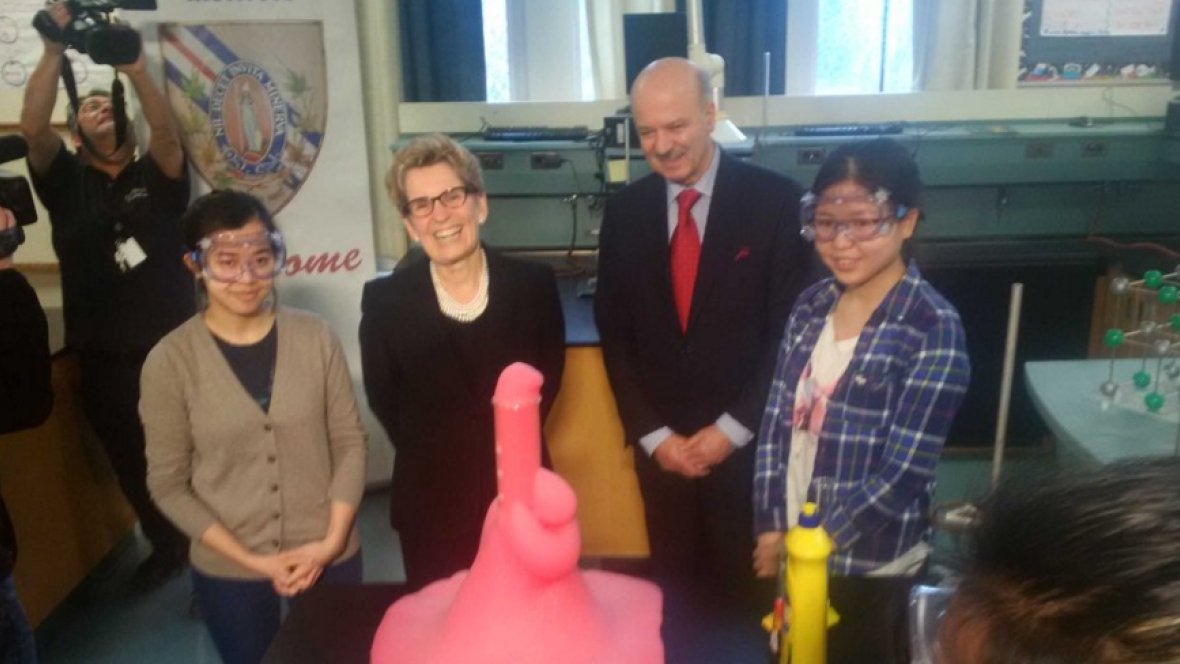 CBCToronto's tweet photo. Pink volcano experiment erupts into awkward photo-op for Kathleen Wynne https://t.co/QG6quy0TBH https://t.co/GHGBW0bbTV