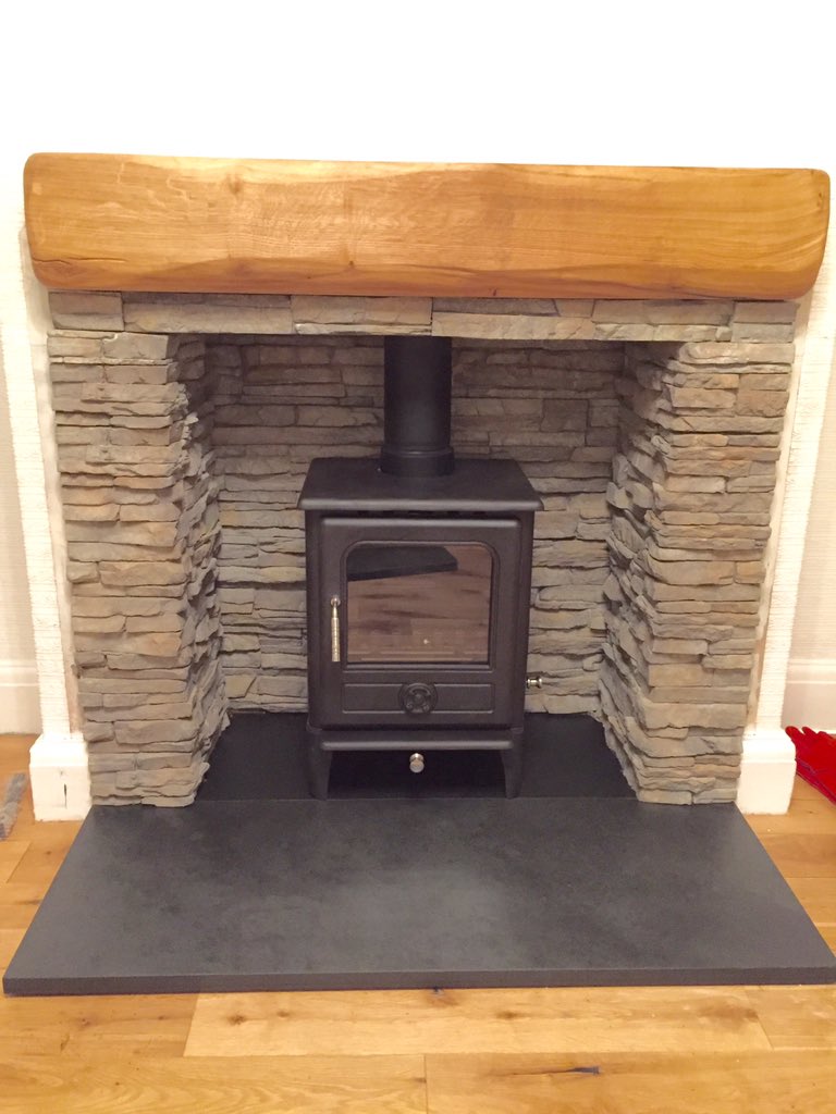 Slate hearth stacked stone chamber oak beam norvik 5 . Supplied by <a href="/dantonfires/">Danton Fireplaces</a>