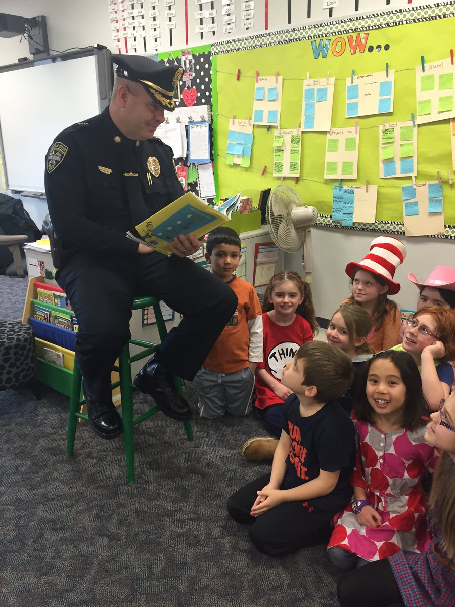 UptonPolice's tweet photo. Chief Bradley at Memorial School this morning reading to Mrs. Couture's 2nd grade class. #ReadAcrossAmerica #uptonpd https://t.co/GxdCXGeGVU