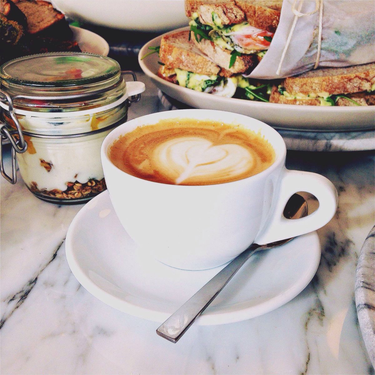 TheCanaryE2's tweet photo. Lunch is being served on girls day, coffee art with housemade almond milk #HinaMatsuri #thecanarye2 #alternative https://t.co/Kj4zTnOQ0D