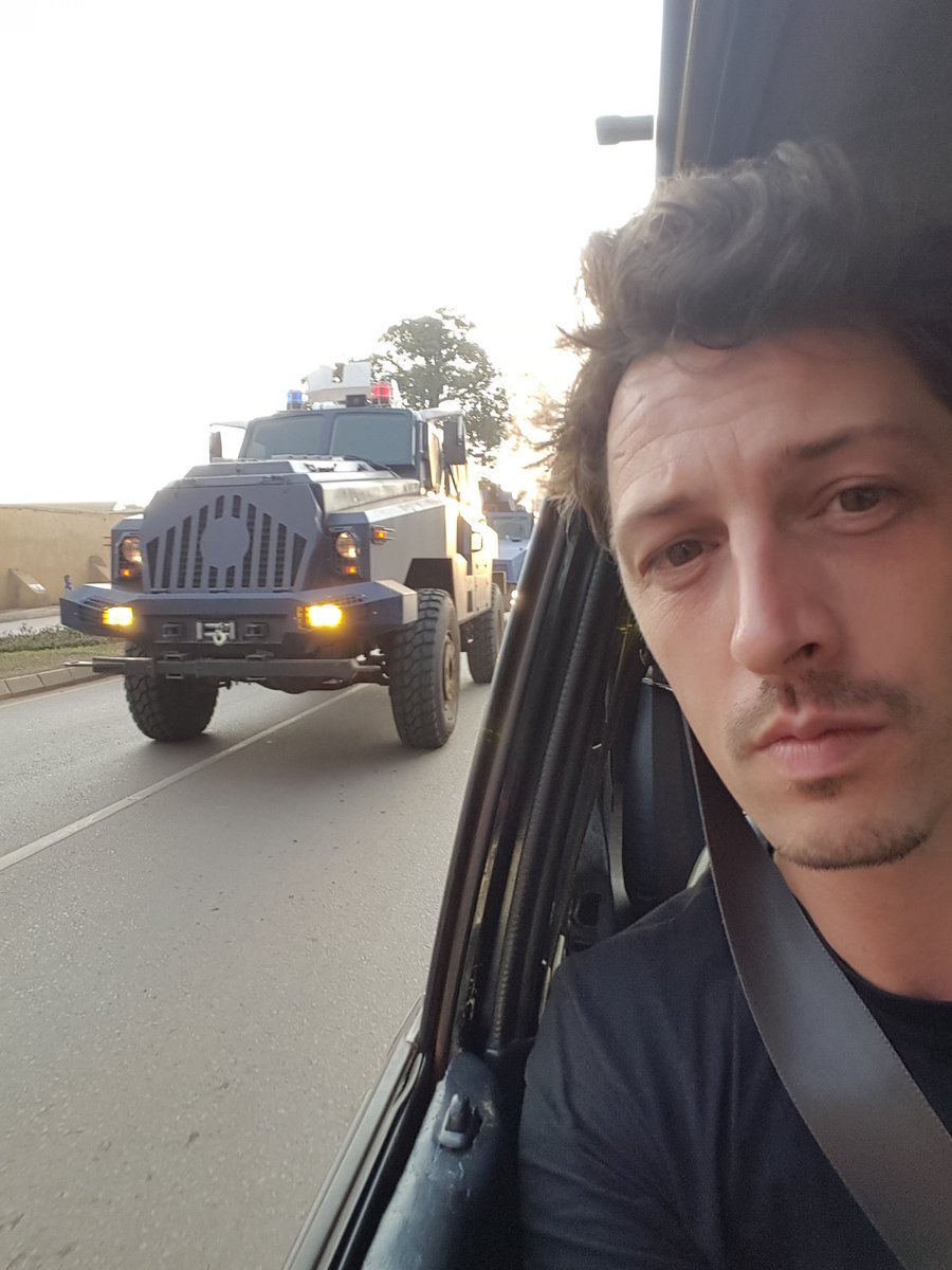 DijkstraWout's tweet photo. Just got pulled over by biggest policecar in #uganda for this picture :) heavy deployment jinjaroad #UgandaDecides https://t.co/cDlc5oLuel