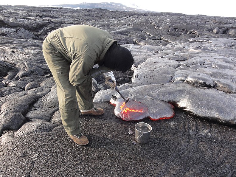 USGS's tweet photo. For your #MagmaMonday- A geologist getting up close and personal w/ molten lava while collecting samples on Kīlauea https://t.co/UZbH0MrMQc