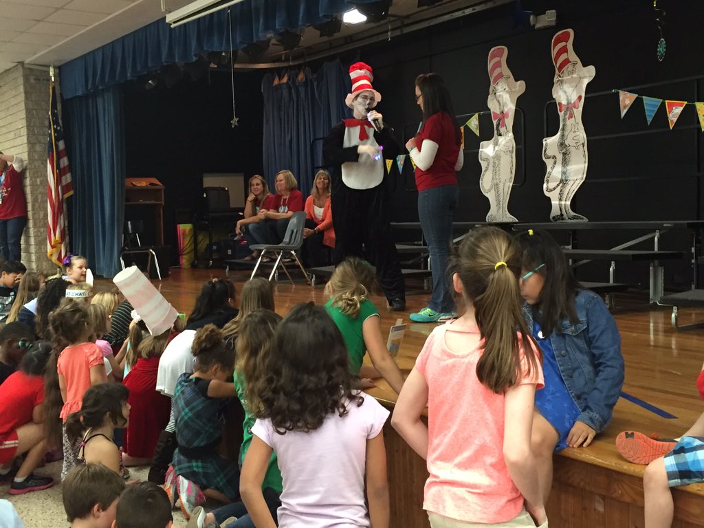 osceolaartists's tweet photo. The Cat in the Hat is here! And guess what he is reading? #awesomeosceola #vscpride https://t.co/ngBHvFmH3j