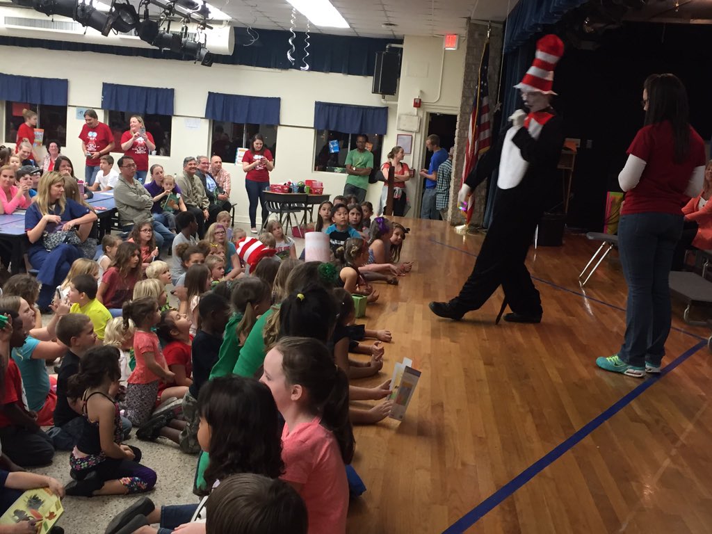 osceolaartists's tweet photo. The Cat in the Hat is here! And guess what he is reading? #awesomeosceola #vscpride https://t.co/ngBHvFmH3j