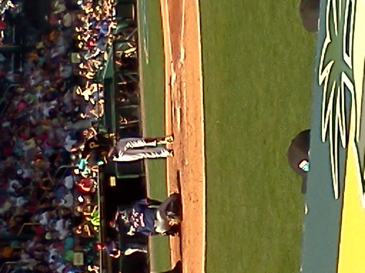 PiratesTalk's tweet photo. Sitting 3rd row bhind Pirate dugout w black pirate hat, by McKechnie Field sign. #TVShot https://t.co/EYP224dtL3
