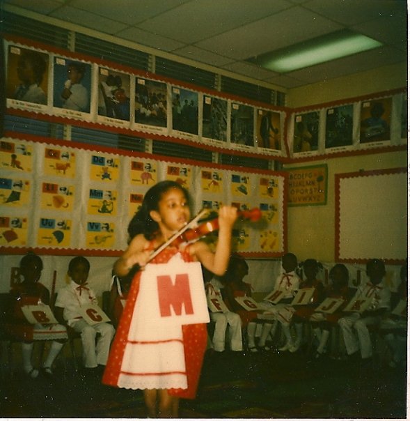 ViolinistTLH's tweet photo. A few years ago I played for kindergarten graduation. . . maybe the "M" I'm wearing stood for music! https://t.co/OfgZ3KYqbM
