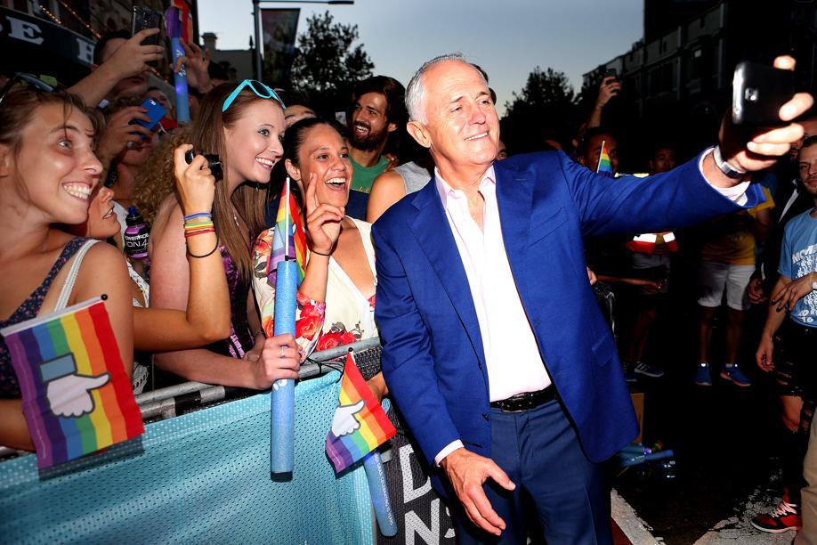 dailytelegraph's tweet photo. PM @TurnbullMalcolm taking selfies with #MardiGras2016 revellers https://t.co/P3XTInE3IC https://t.co/j9VfOOEdib