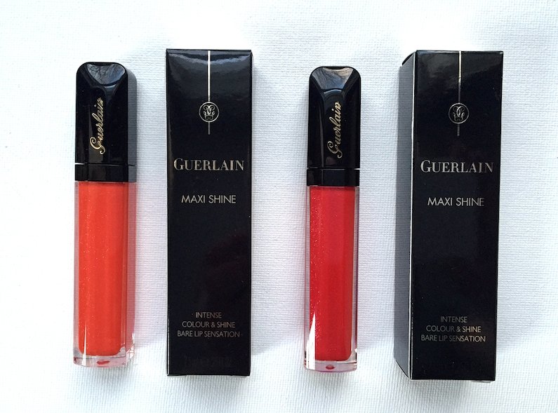NEW Guerlain lip gloss twitter giveaway! Win this duo in Tangerine Vlam &amp; Red Pow! To enter follow <a href="/davelackie/">dave lackie</a> &amp; RT