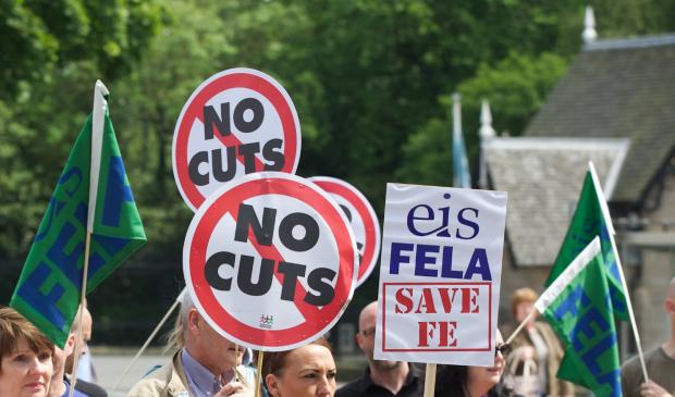 Colleges across Scotland face disruption after lecturers back strike action in row over pay.