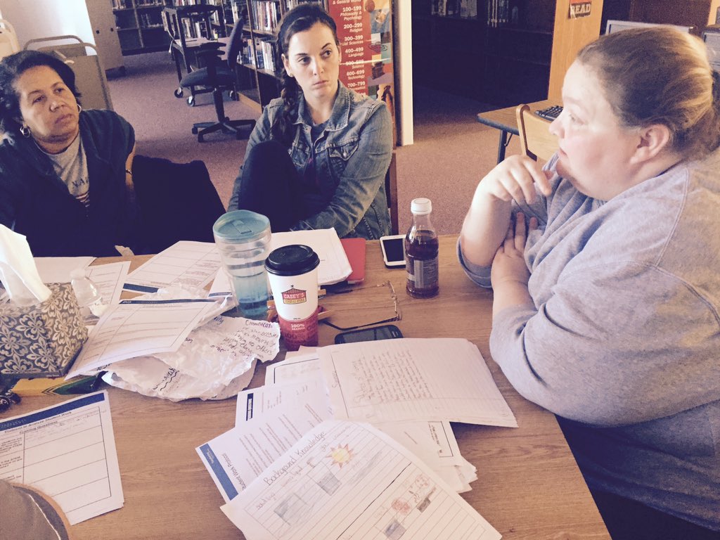 Ts examining st work using a protocol with clarifying questions and discussion.  Making STEM connections.