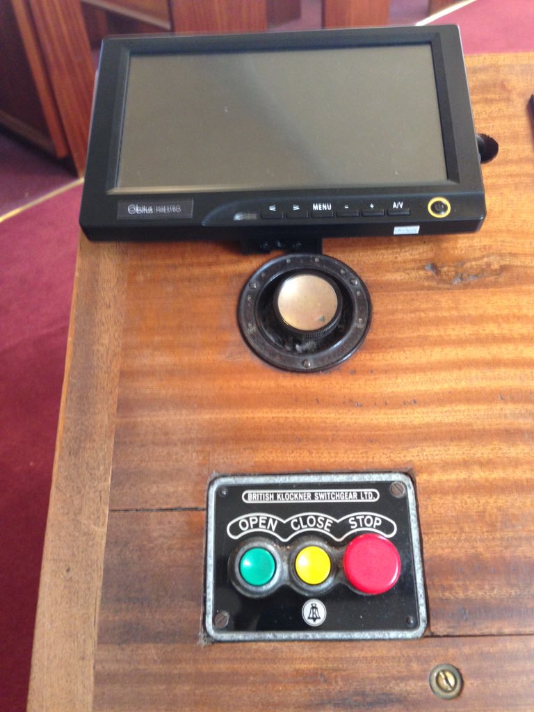 DeathGoesD's tweet image. Interesting how #funeraltech is replacing old systems. Lectern in a crem has old buttons &amp;amp; new media system.