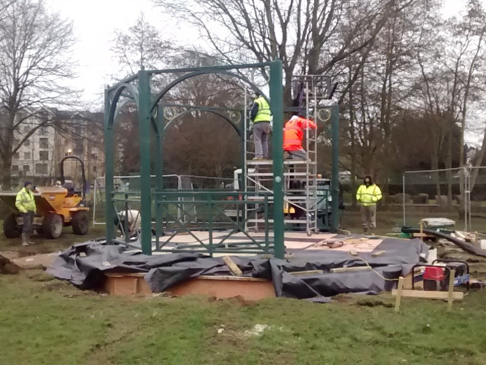 Big boys (and girls) Meccano?  The bandstand going up on Sworders Field.