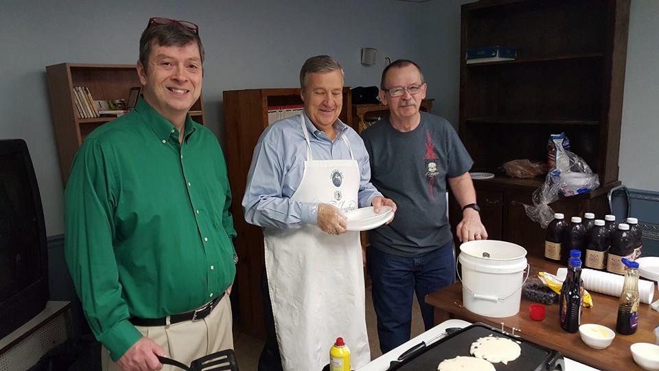 Dan, Stephen &amp; Monty from First Presby making pancakes, adding flair Thursday with chocolate chips &amp;blueberries.