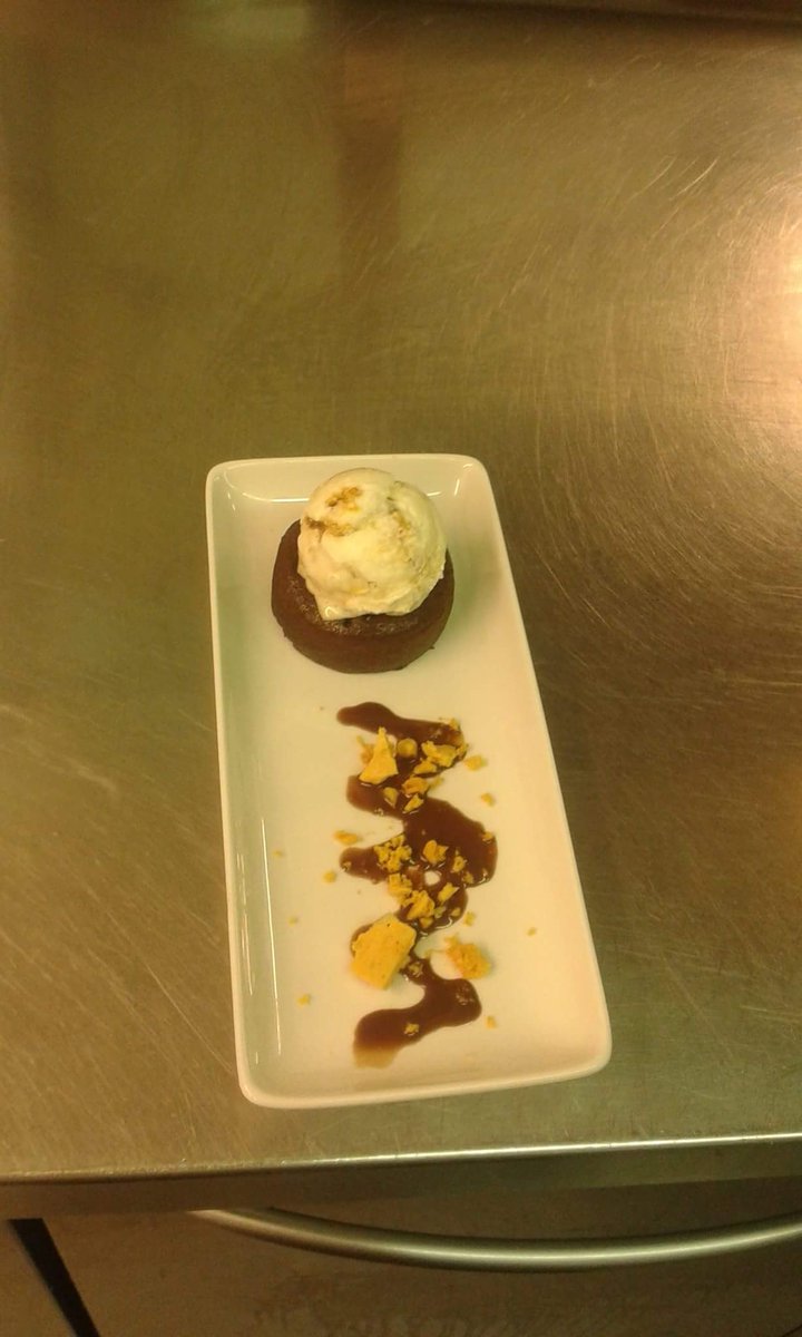 jacob_chef's tweet photo. Chocolate fondant served with honeycombe ice cream and a chocolate sauce with crushed honeycombe https://t.co/AAHY3kSOlW