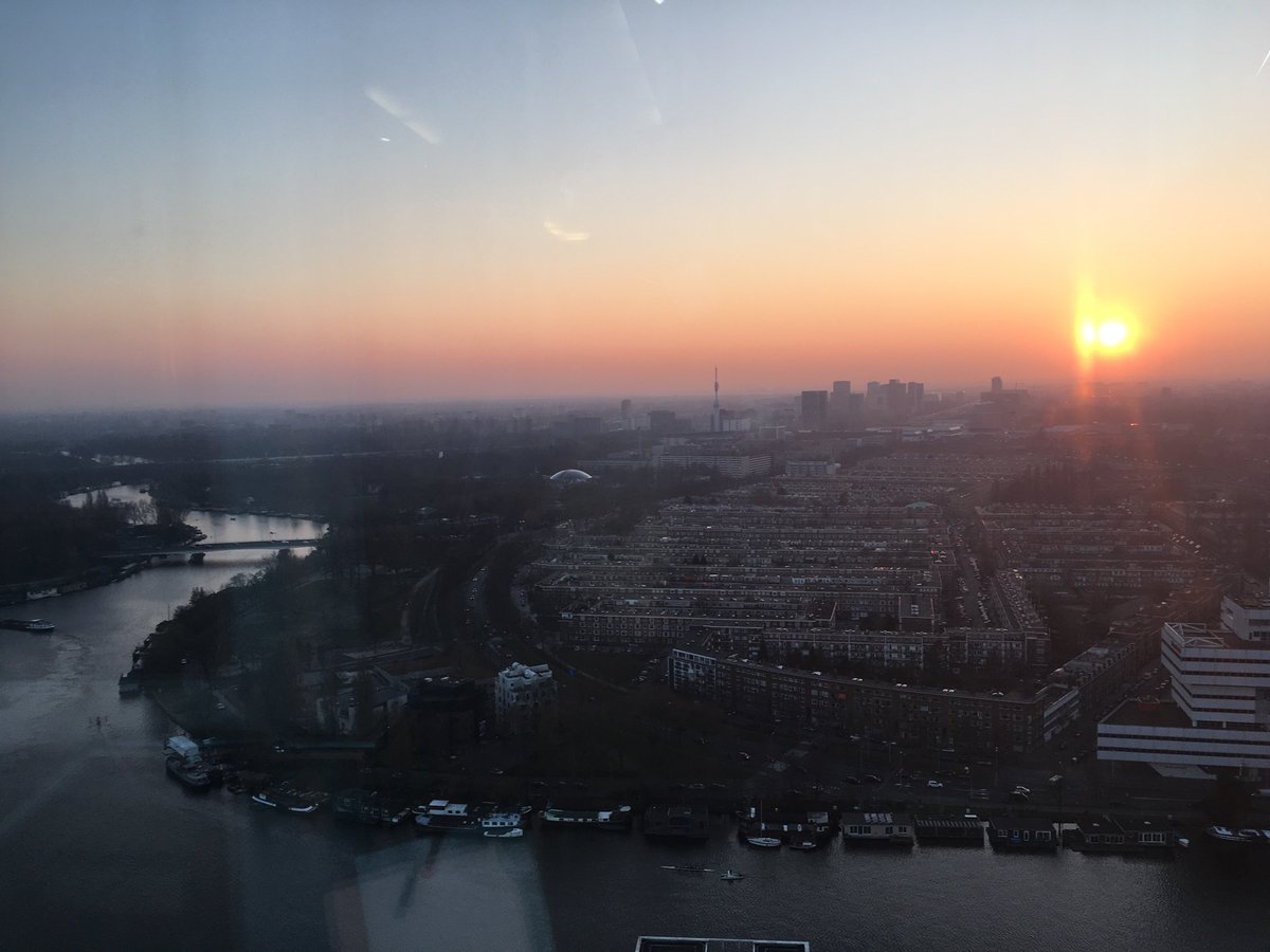 Clickly_co's tweet image. Yesterday a event @DeltaLloyd with this fantastic view over Amsterdam, enjoying this rare sunset. We love this city.