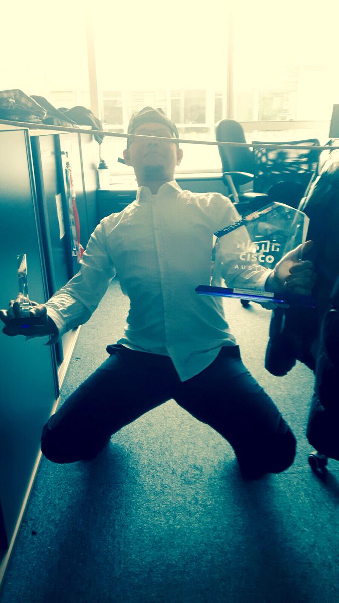 IMAT_Flyhigher's tweet photo. Friday - limbo-day! Colleague Werner balancing the #distioftheyear #award :-) #DCCIMAT @CiscoDistEMEAR https://t.co/aDFqyOnEUK